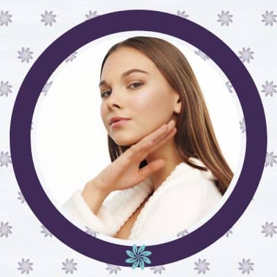 Woman holding hand under her low jaw