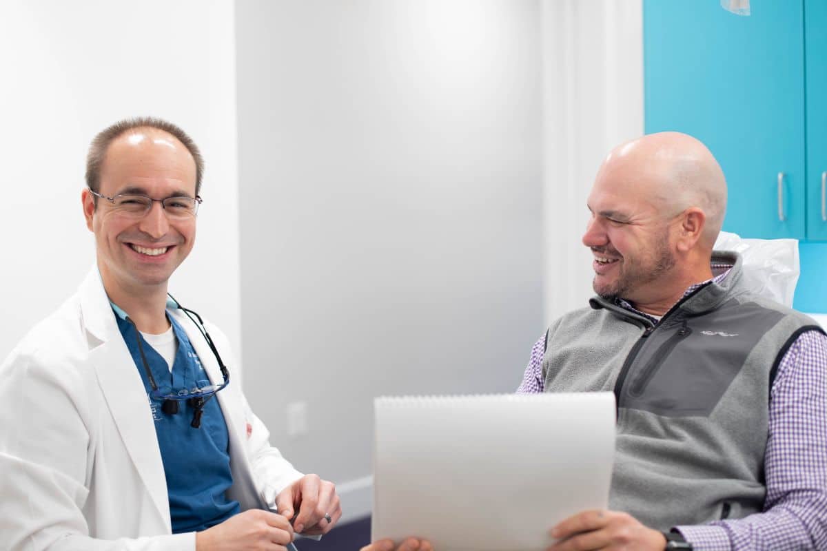 Dr thanos dounis with patient smiling